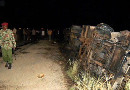 At least 91 people were burnt to death on Saturday night when a petrol tanker from which they were siphoning off petrol burst into flames near Molo town in northwest Kenya, police said.