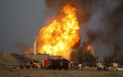 Description: Iraqi Fire Fighters Arrive At The Scene Of A Fire At A Gas Compression Facility
