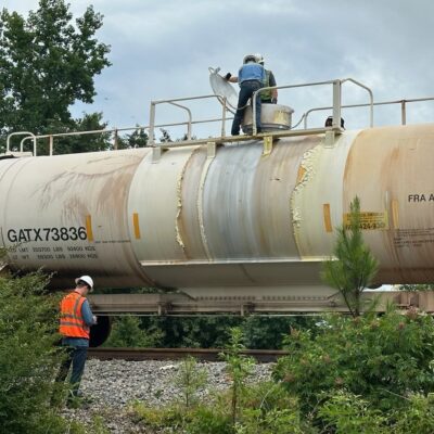 hazardous spill Authorities investigate the scene of a fire in a rail car on a freight train off highway 367 near McRae on Monday, June 17, 2024. (Arkansas Democrat-Gazette/Colin Murphey).