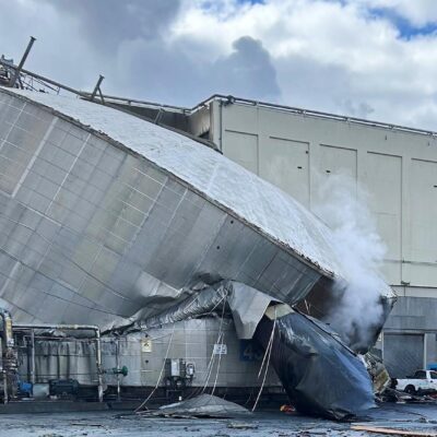 Washington State Chemical Plant Failure This photo provided by the City of Longview, Wash., shows structural damage to the Nippon Dynawave Packaging Co., after a tank containing hazardous liquid imploded, on Tuesday, May 26, 2026 in Longview, Wash. (City of Longview via AP)